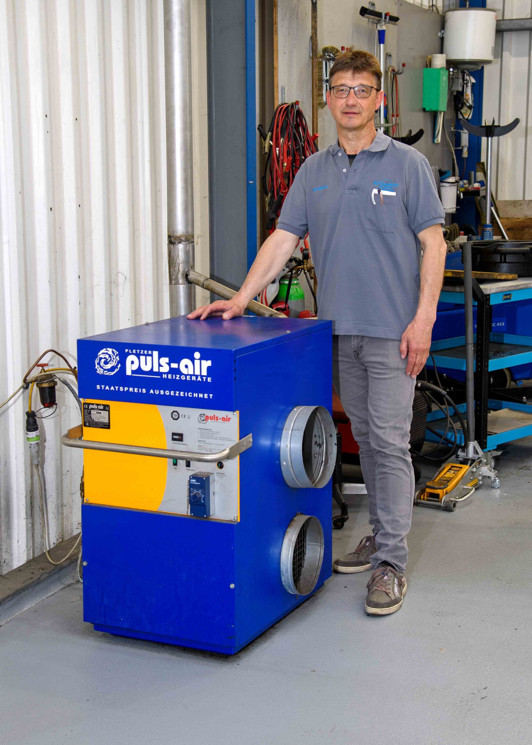Joe Knecht with pulse-air workshop heating