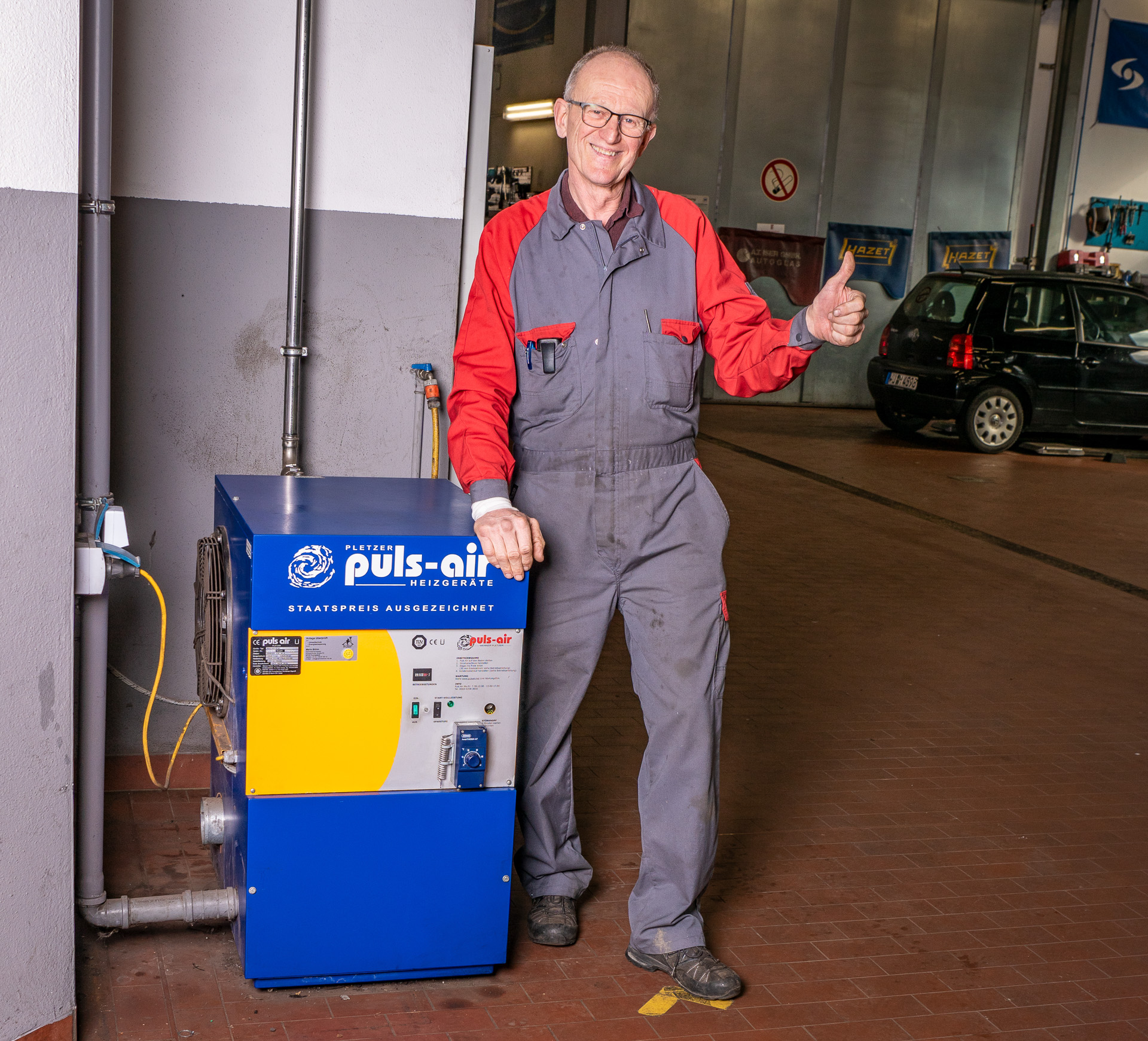 Owner Robert Ackermann with the efficient Puls-air heater